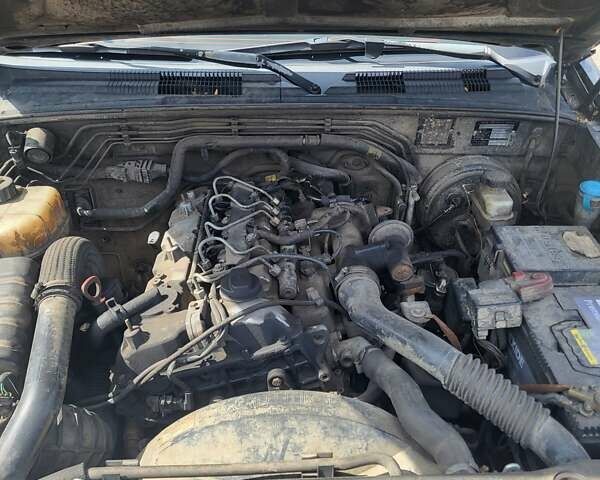 Чорний Cанг Йонг Rexton, об'ємом двигуна 2.7 л та пробігом 118 тис. км за 6000 $, фото 1 на Automoto.ua