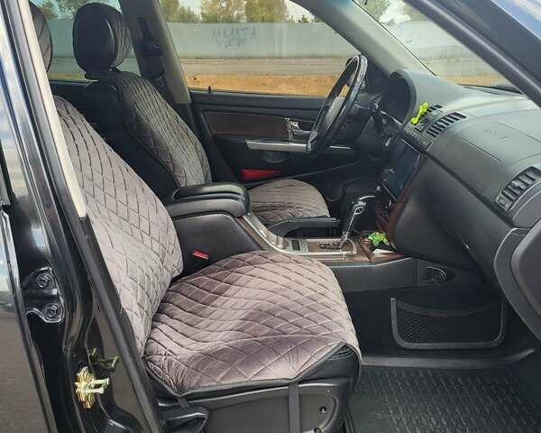 Чорний Cанг Йонг Rexton, об'ємом двигуна 2.7 л та пробігом 118 тис. км за 6000 $, фото 6 на Automoto.ua