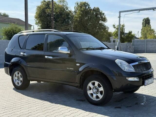 Черный Cанг Йонг Рекстон, объемом двигателя 2.9 л и пробегом 1 тыс. км за 1700 $, фото 2 на Automoto.ua