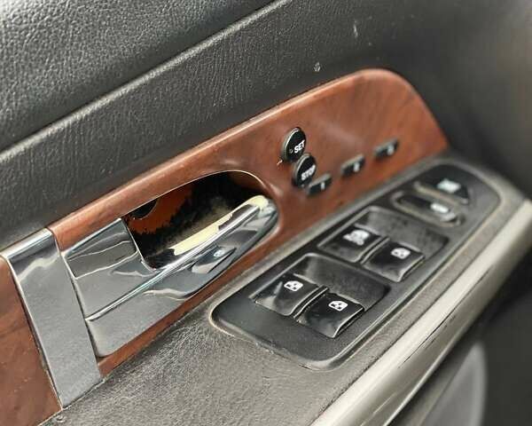 Чорний Cанг Йонг Rexton, об'ємом двигуна 2.8 л та пробігом 120 тис. км за 4400 $, фото 8 на Automoto.ua
