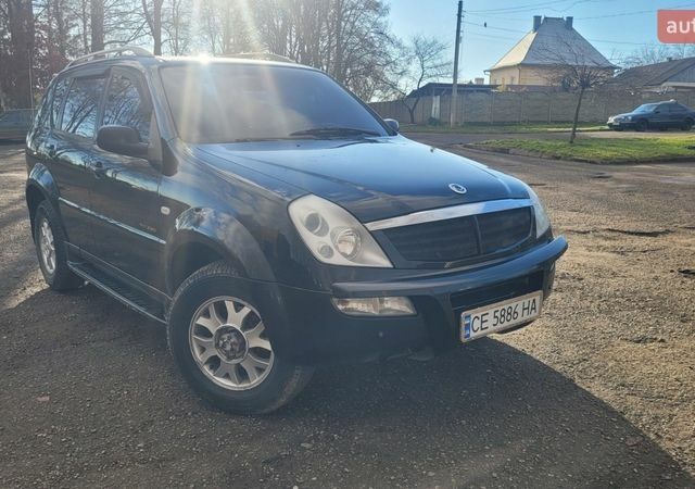 Черный Cанг Йонг Рекстон, объемом двигателя 2.3 л и пробегом 225 тыс. км за 5200 $, фото 7 на Automoto.ua