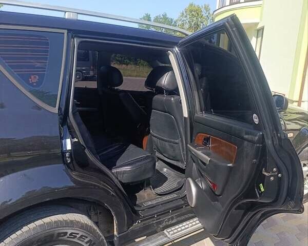 Чорний Cанг Йонг Rexton, об'ємом двигуна 2.7 л та пробігом 389 тис. км за 5900 $, фото 8 на Automoto.ua