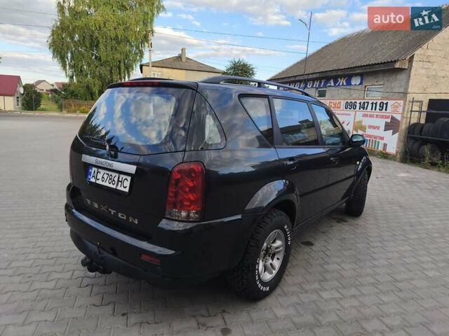 Чорний Cанг Йонг Rexton, об'ємом двигуна 2.7 л та пробігом 240 тис. км за 6600 $, фото 10 на Automoto.ua