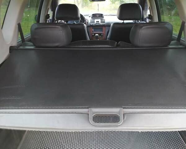 Черный Cанг Йонг Рекстон, объемом двигателя 2.7 л и пробегом 380 тыс. км за 7500 $, фото 14 на Automoto.ua