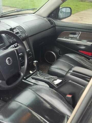 Черный Cанг Йонг Рекстон, объемом двигателя 2.7 л и пробегом 300 тыс. км за 3800 $, фото 2 на Automoto.ua