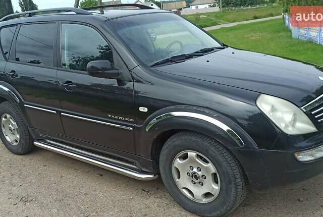 Чорний Cанг Йонг Rexton, об'ємом двигуна 2.69 л та пробігом 237 тис. км за 6400 $, фото 3 на Automoto.ua