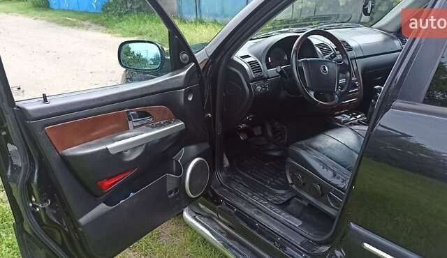 Чорний Cанг Йонг Rexton, об'ємом двигуна 2.69 л та пробігом 237 тис. км за 6400 $, фото 7 на Automoto.ua