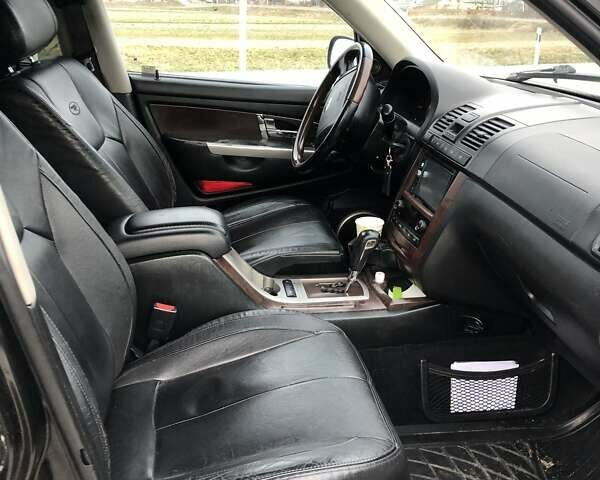 Чорний Cанг Йонг Rexton, об'ємом двигуна 2.7 л та пробігом 130 тис. км за 7500 $, фото 5 на Automoto.ua