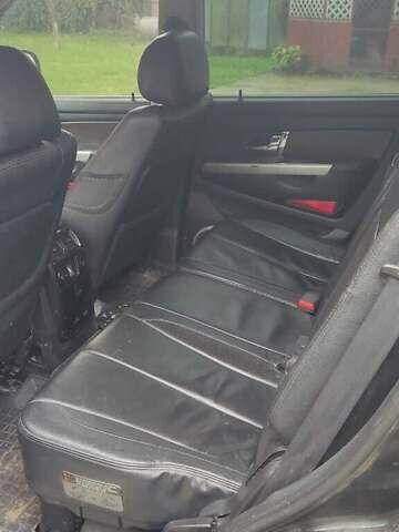 Черный Cанг Йонг Рекстон, объемом двигателя 2.7 л и пробегом 300 тыс. км за 3800 $, фото 3 на Automoto.ua