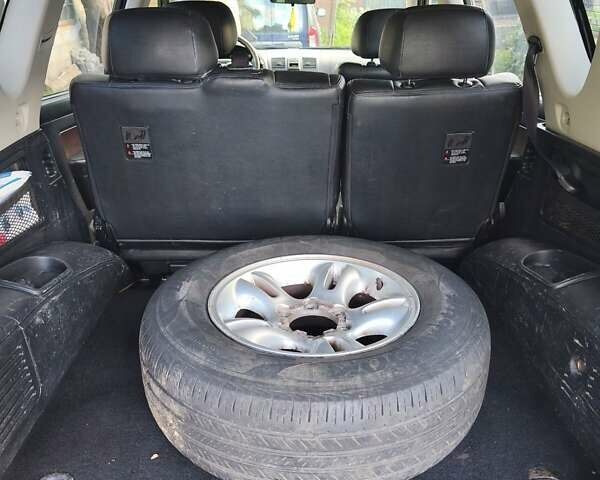 Чорний Cанг Йонг Rexton, об'ємом двигуна 2.7 л та пробігом 240 тис. км за 6600 $, фото 18 на Automoto.ua
