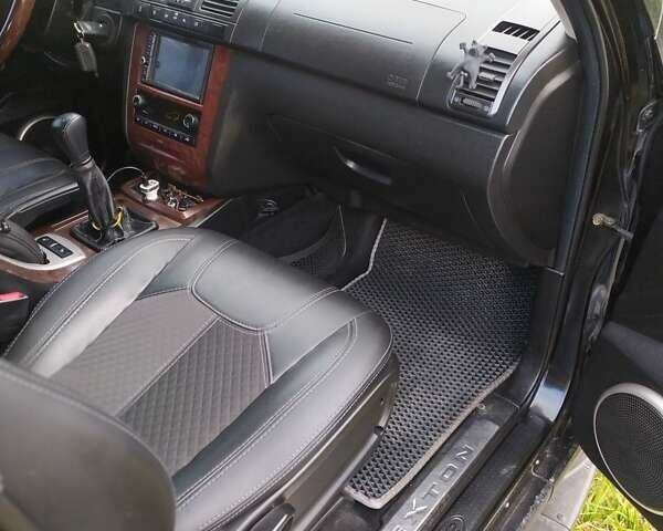 Черный Cанг Йонг Рекстон, объемом двигателя 2.7 л и пробегом 380 тыс. км за 7500 $, фото 13 на Automoto.ua