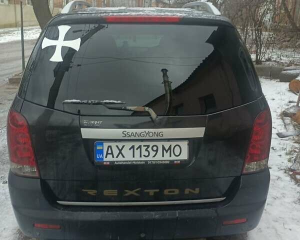 Чорний Cанг Йонг Rexton, об'ємом двигуна 2.7 л та пробігом 174 тис. км за 7000 $, фото 3 на Automoto.ua