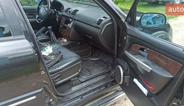 Чорний Cанг Йонг Rexton, об'ємом двигуна 2.69 л та пробігом 242 тис. км за 5950 $, фото 8 на Automoto.ua