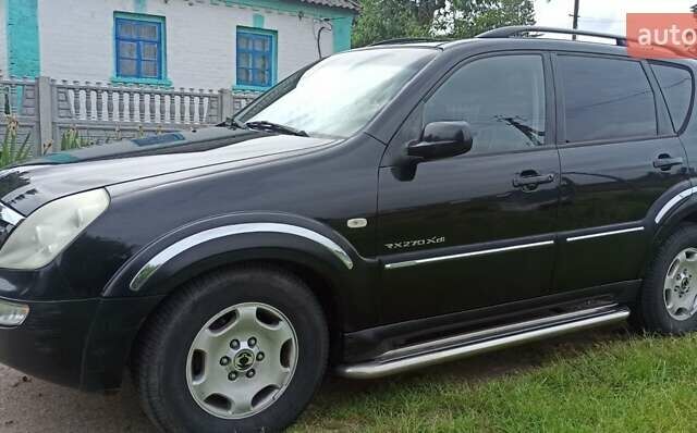 Чорний Cанг Йонг Rexton, об'ємом двигуна 2.69 л та пробігом 237 тис. км за 6400 $, фото 2 на Automoto.ua