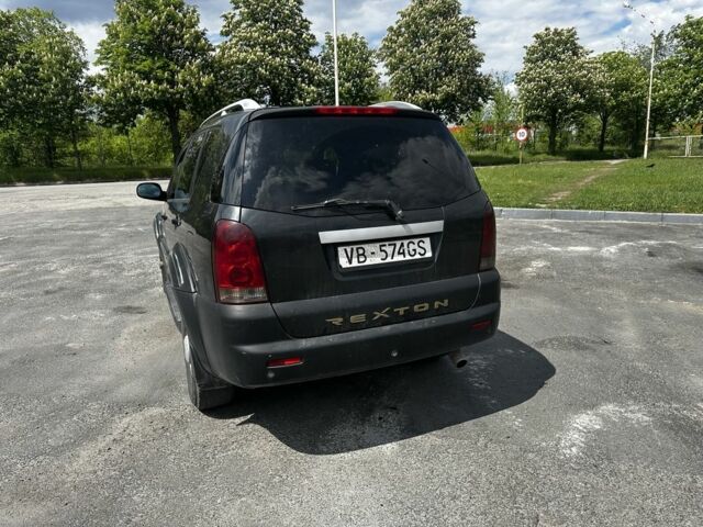 Черный Cанг Йонг Рекстон, объемом двигателя 2.7 л и пробегом 250 тыс. км за 3500 $, фото 2 на Automoto.ua