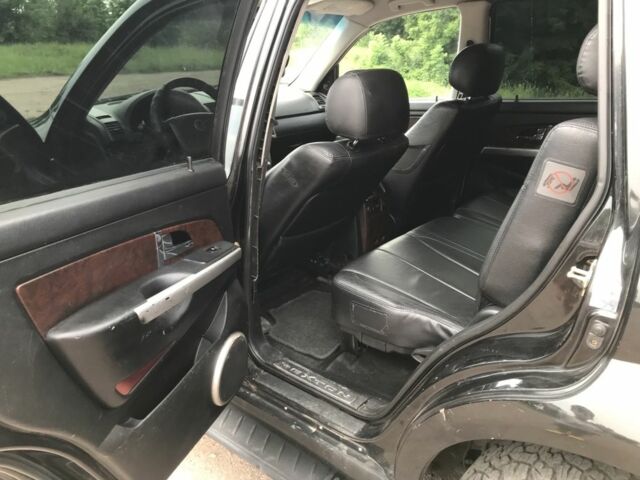 Чорний Cанг Йонг Rexton, об'ємом двигуна 2.7 л та пробігом 253 тис. км за 4999 $, фото 11 на Automoto.ua