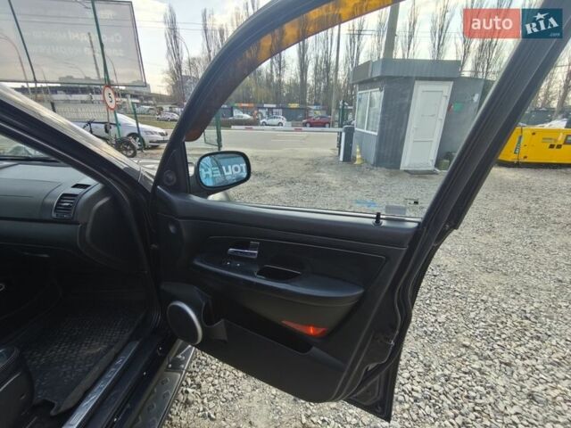 Черный Cанг Йонг Рекстон, объемом двигателя 2.7 л и пробегом 195 тыс. км за 8500 $, фото 16 на Automoto.ua