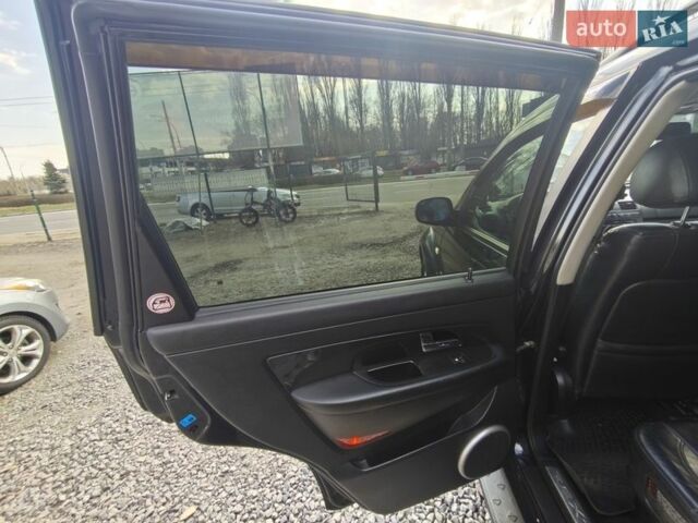 Черный Cанг Йонг Рекстон, объемом двигателя 2.7 л и пробегом 195 тыс. км за 8500 $, фото 13 на Automoto.ua