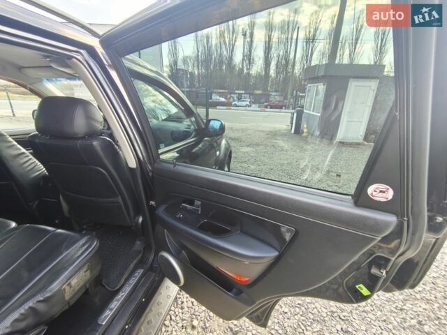 Чорний Cанг Йонг Rexton, об'ємом двигуна 2.7 л та пробігом 195 тис. км за 8150 $, фото 19 на Automoto.ua