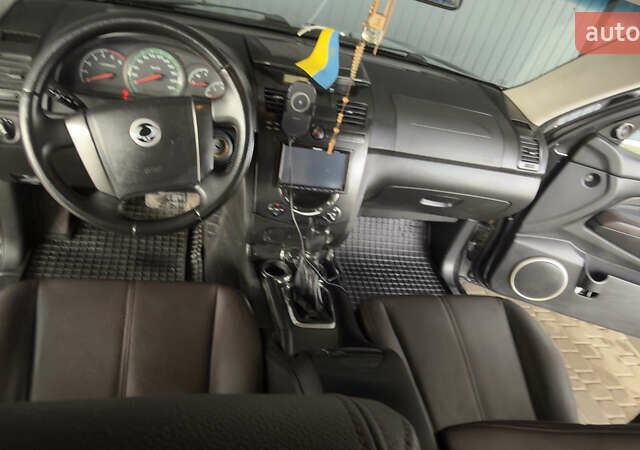 Черный Cанг Йонг Рекстон, объемом двигателя 2.7 л и пробегом 280 тыс. км за 8500 $, фото 10 на Automoto.ua