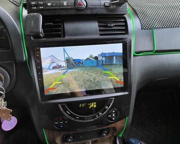 Черный Cанг Йонг Рекстон, объемом двигателя 2.7 л и пробегом 200 тыс. км за 5500 $, фото 5 на Automoto.ua
