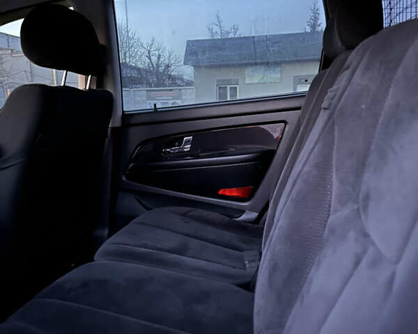 Чорний Cанг Йонг Rexton, об'ємом двигуна 2.7 л та пробігом 312 тис. км за 5950 $, фото 7 на Automoto.ua