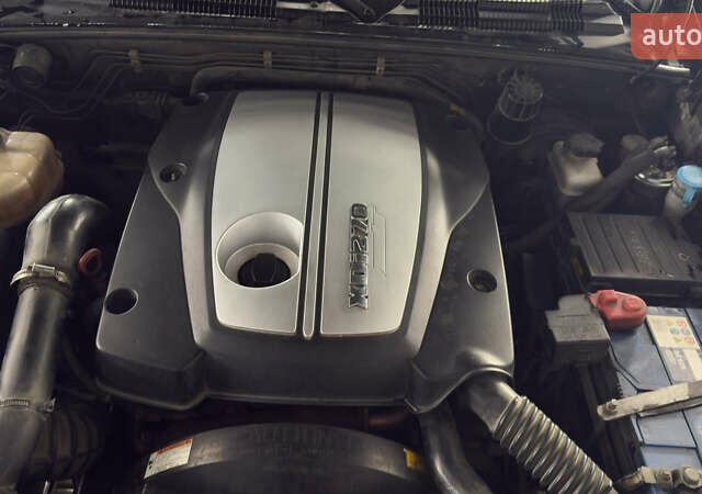 Черный Cанг Йонг Рекстон, объемом двигателя 2.7 л и пробегом 280 тыс. км за 8500 $, фото 8 на Automoto.ua