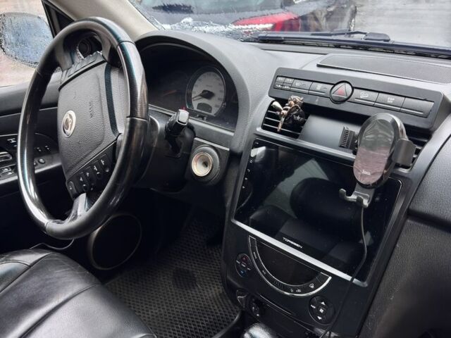 Черный Cанг Йонг Рекстон, объемом двигателя 2.7 л и пробегом 385 тыс. км за 5500 $, фото 7 на Automoto.ua