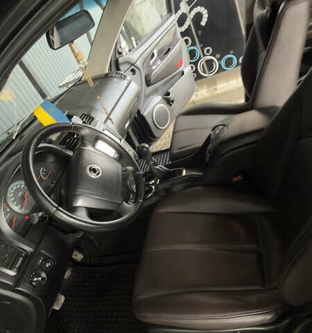 Черный Cанг Йонг Рекстон, объемом двигателя 2.7 л и пробегом 280 тыс. км за 8500 $, фото 3 на Automoto.ua