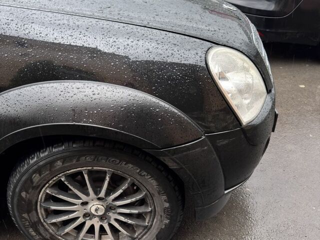 Черный Cанг Йонг Рекстон, объемом двигателя 2.7 л и пробегом 385 тыс. км за 5500 $, фото 8 на Automoto.ua