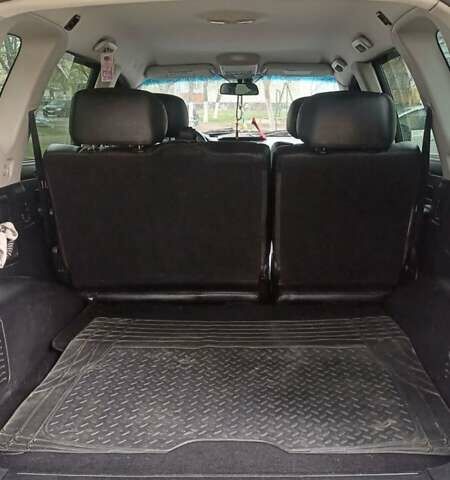 Черный Cанг Йонг Рекстон, объемом двигателя 2.7 л и пробегом 215 тыс. км за 7650 $, фото 7 на Automoto.ua