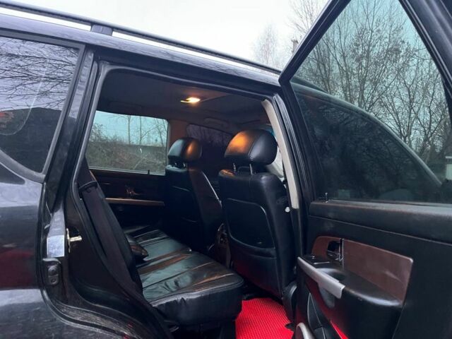 Черный Cанг Йонг Рекстон, объемом двигателя 2.7 л и пробегом 247 тыс. км за 2500 $, фото 10 на Automoto.ua