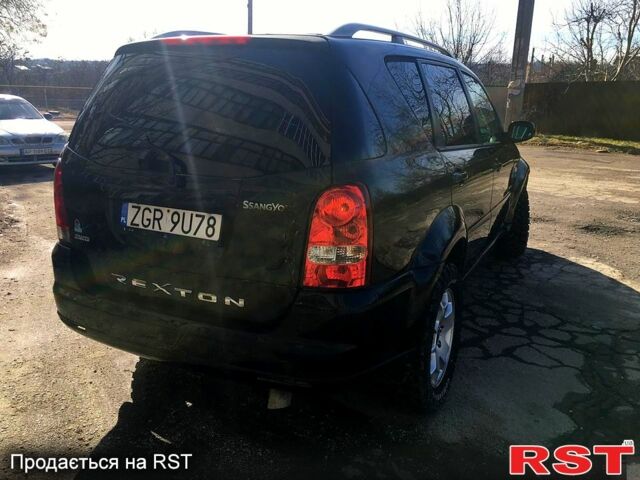 Черный Cанг Йонг Рекстон, объемом двигателя 2.7 л и пробегом 304 тыс. км за 4000 $, фото 3 на Automoto.ua