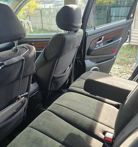 Чорний Cанг Йонг Rexton, об'ємом двигуна 2.7 л та пробігом 398 тис. км за 7500 $, фото 6 на Automoto.ua