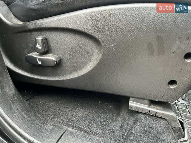 Чорний Cанг Йонг Rexton, об'ємом двигуна 2.69 л та пробігом 234 тис. км за 7150 $, фото 15 на Automoto.ua