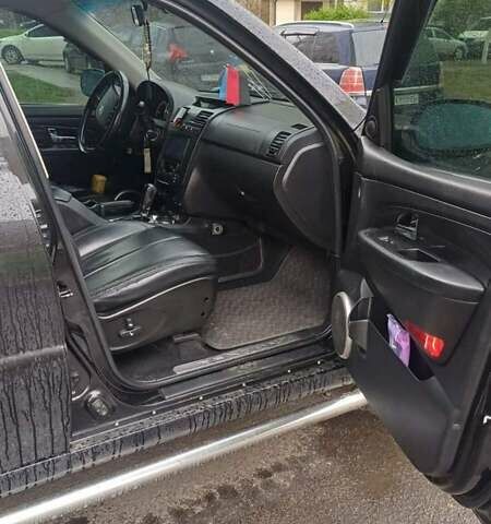 Черный Cанг Йонг Рекстон, объемом двигателя 2.7 л и пробегом 215 тыс. км за 7650 $, фото 5 на Automoto.ua