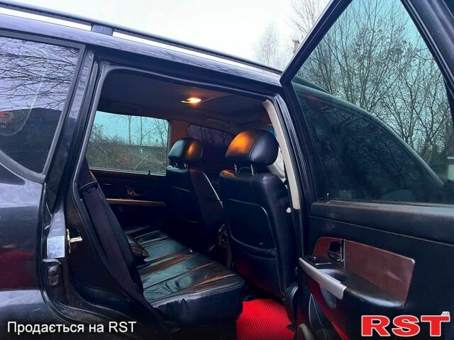 Черный Cанг Йонг Рекстон, объемом двигателя 2.7 л и пробегом 245 тыс. км за 2500 $, фото 12 на Automoto.ua