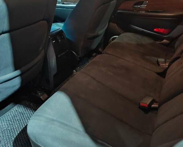 Черный Cанг Йонг Рекстон, объемом двигателя 2.7 л и пробегом 305 тыс. км за 6300 $, фото 4 на Automoto.ua