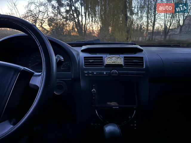 Чорний Cанг Йонг Rexton, об'ємом двигуна 2.7 л та пробігом 312 тис. км за 5950 $, фото 9 на Automoto.ua