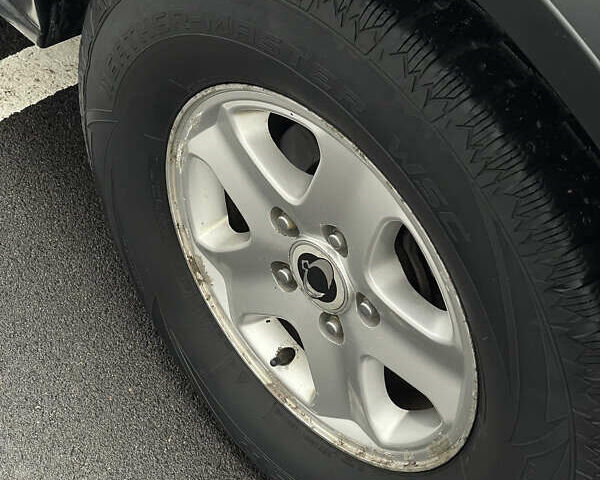 Черный Cанг Йонг Рекстон, объемом двигателя 2.7 л и пробегом 511 тыс. км за 4950 $, фото 14 на Automoto.ua