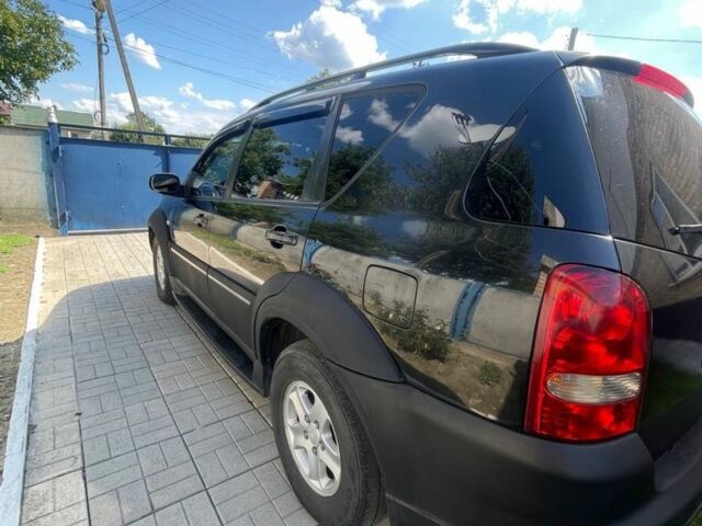 Чорний Cанг Йонг Rexton, об'ємом двигуна 2.7 л та пробігом 310 тис. км за 7000 $, фото 1 на Automoto.ua