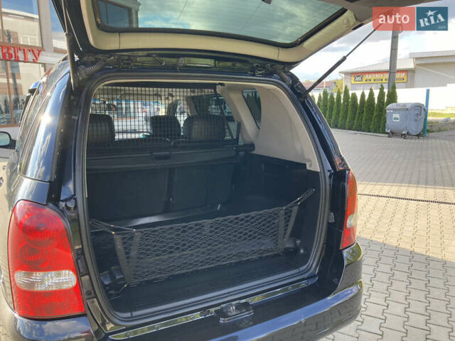 Чорний Cанг Йонг Rexton, об'ємом двигуна 2.7 л та пробігом 159 тис. км за 8900 $, фото 19 на Automoto.ua
