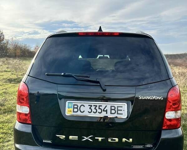 Черный Cанг Йонг Рекстон, объемом двигателя 2.7 л и пробегом 246 тыс. км за 6600 $, фото 1 на Automoto.ua
