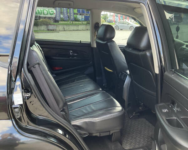 Чорний Cанг Йонг Rexton, об'ємом двигуна 2.7 л та пробігом 159 тис. км за 8499 $, фото 13 на Automoto.ua