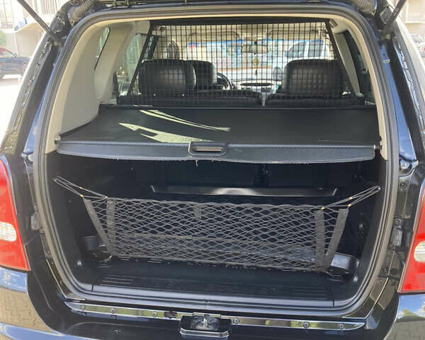 Чорний Cанг Йонг Rexton, об'ємом двигуна 2.7 л та пробігом 159 тис. км за 8499 $, фото 23 на Automoto.ua