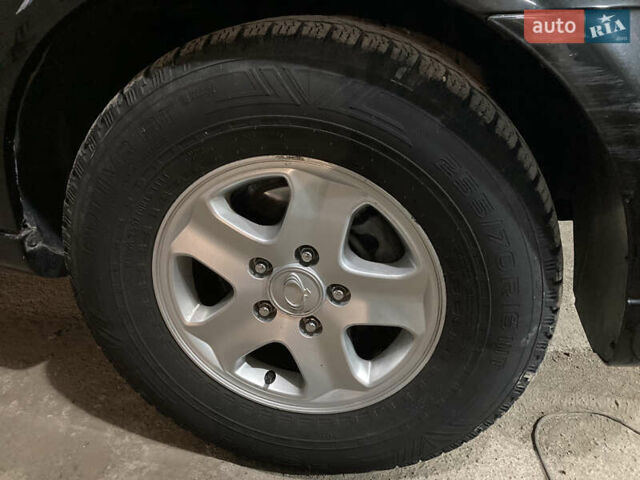 Чорний Cанг Йонг Rexton, об'ємом двигуна 2.7 л та пробігом 159 тис. км за 8900 $, фото 27 на Automoto.ua