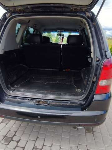 Черный Cанг Йонг Рекстон, объемом двигателя 2.7 л и пробегом 230 тыс. км за 8000 $, фото 15 на Automoto.ua