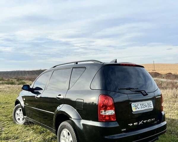 Черный Cанг Йонг Рекстон, объемом двигателя 2.7 л и пробегом 246 тыс. км за 6600 $, фото 7 на Automoto.ua