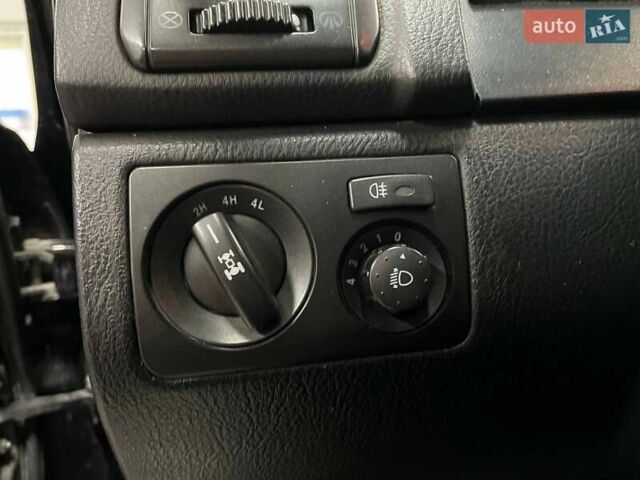 Черный Cанг Йонг Рекстон, объемом двигателя 2.7 л и пробегом 218 тыс. км за 7490 $, фото 18 на Automoto.ua