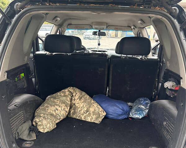 Чорний Cанг Йонг Rexton, об'ємом двигуна 2.7 л та пробігом 248 тис. км за 4100 $, фото 13 на Automoto.ua